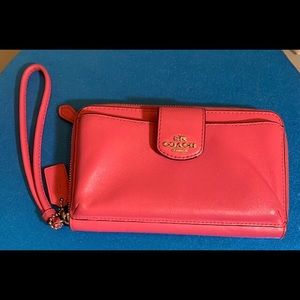 COACH pink leather wristlet/wallet